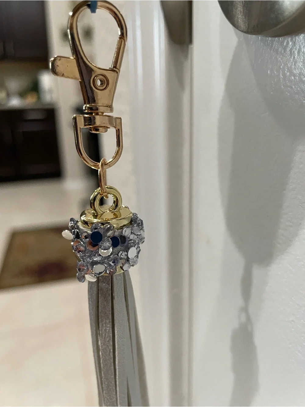 Blinged Keychain w gray leather fringe 🔑 Has goldtone hardware 🗝️ Brand New